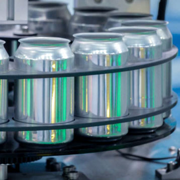 cans on conveyor belt