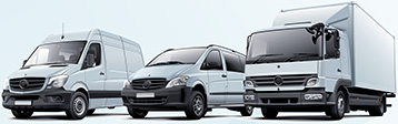 three commercial vehicles
